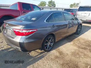 2015 Toyota Camry XLE with VIN 4T1BF1FK1FU895551, listed as a IAAI auction lot 40253286 with 221,273 mi miles and . Bid and sale history available at DreamBid. Image 4.