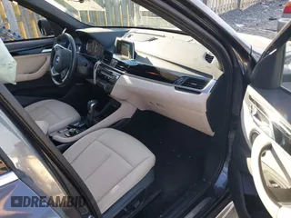 2018 BMW X1 xDrive28i with VIN WBXHT3C32J5L31896, listed as a IAAI auction lot 41675944 with 47,190 mi miles. Bid and sale history available at carsss.com. Image 5.
