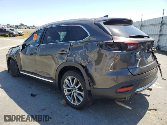 2018 Mazda CX-9 Grand Touring with VIN JM3TCADY5J0200052, listed as a Copart auction lot 55160715 with 68,464 mi miles and Salvage title. Bid and sale history available at DreamBid. Image 2.