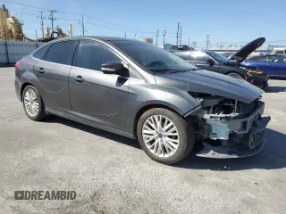 2017 Ford Focus Titanium with VIN 1FADP3J22HL279854, listed as a Copart auction lot 61209135 with 106,323 mi miles and Salvage title. Bid and sale history available at DreamBid. Image 4.