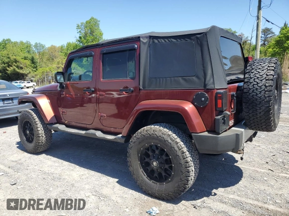 2010 Jeep Wrangler Unlimited Sahara with VIN 1J4BA5H11AL107228, listed as a Copart auction lot 54761705 with 102,816 mi miles and Clean Title. Bid and sale history available at carsss.com. Image 2.