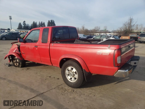 1999 Nissan Frontier XE with VIN 1N6ED26Y2XC312863, listed as a Copart auction lot 42259015 with 212,666 mi miles and Salvage title. Bid and sale history available at DreamBid. Image 2.
