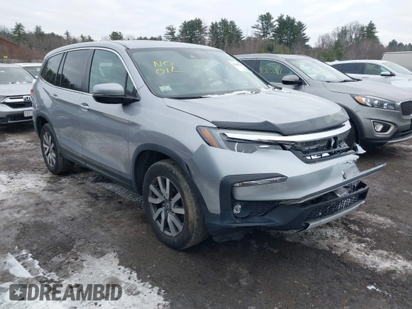 2021 Honda Pilot EX-L with VIN 5FNYF6H57MB010259, listed as a IAAI auction lot 41307012 with 57,849 mi miles. Bid and sale history available at carsss.com. Image 1.