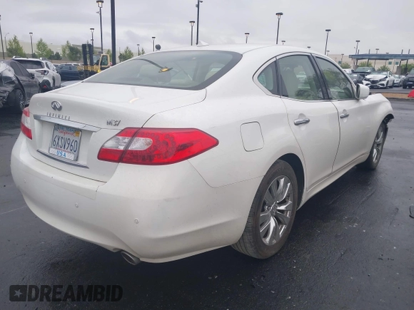 2013 Infiniti M with VIN JN1BY1AP2DM510953, listed as a IAAI auction lot 42157597 with 71,175 mi miles and . Bid and sale history available at DreamBid. Image 4.