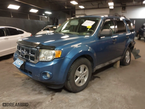 2009 Ford Escape XLT with VIN 1FMCU93G99KB70918, listed as a IAAI auction lot 41942399 with 141,158 mi miles. Bid and sale history available at carsss.com. Image 18.