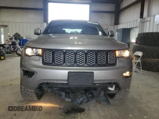 2017 Jeep Grand Cherokee Altitude with VIN 1C4RJFAG9HC772705, listed as a Copart auction lot 61562925 with 184,004 mi miles and Salvage title. Bid and sale history available at DreamBid. Image 5.