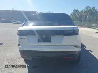 2025 Land Rover Range Rover Velar Dynamic SE with VIN SALYL2EX9SA802869, listed as a IAAI auction lot 41793091 with 5,614 mi miles and . Bid and sale history available at DreamBid. Image 17.