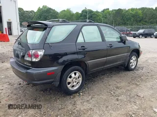 2001 Lexus RX 300 z VIN JTJHF10U710207770, wystawiony jako IAAI lot #42410712 z przebiegiem 250 719 mil mil oraz . Historia ofert i sprzedaży dostępna na DreamBid. Obrazek 4.