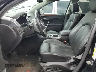 2014 Cadillac SRX Premium Collection z VIN 3GYFNGE3XES577569, wystawiony jako Copart lot #48399735 z przebiegiem Nie podano mil oraz Szkoda całkowita • Salvage title. Historia ofert i sprzedaży dostępna na DreamBid. Obrazek 7.