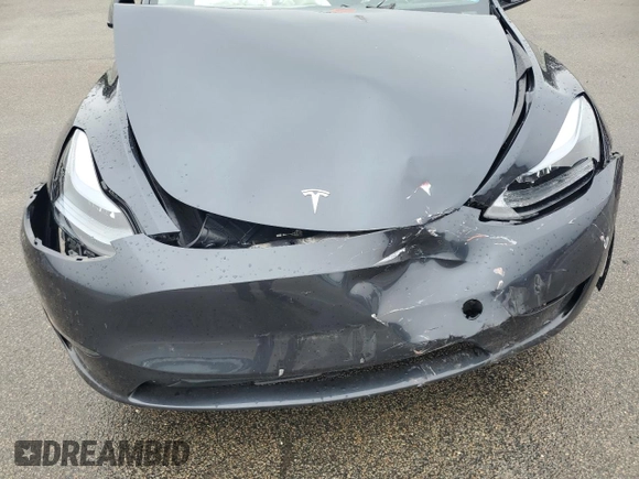 2024 Tesla Model Y Long Range с VIN 7SAYGDEE7RF180945, выставлен на аукционе Copart как лот 62059735 с пробегом Не указан миль и Списание • Salvage title. История ставок и продаж доступна на DreamBid. Изображение 12.
