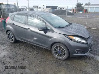 2016 Ford Fiesta SE z VIN 3FADP4EJ5GM120346, wystawiony jako IAAI lot #41945883 z przebiegiem 149 962 mil mil oraz . Historia ofert i sprzedaży dostępna na DreamBid. Obrazek 1.