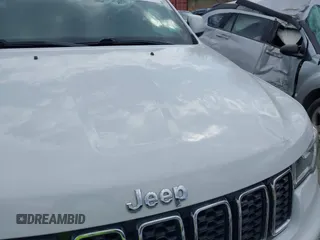 2018 Jeep Grand Cherokee Laredo z VIN 1C4RJFAG1JC479838, wystawiony jako IAAI lot #41903955 z przebiegiem 73 076 mil mil oraz . Historia ofert i sprzedaży dostępna na DreamBid. Obrazek 19.