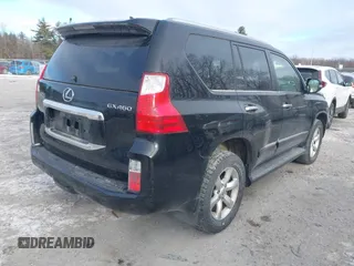 2012 Lexus GX 460 with VIN JTJBM7FX4C5049393, listed as a IAAI auction lot 41315568 with 148,010 mi miles. Bid and sale history available at carsss.com. Image 4.