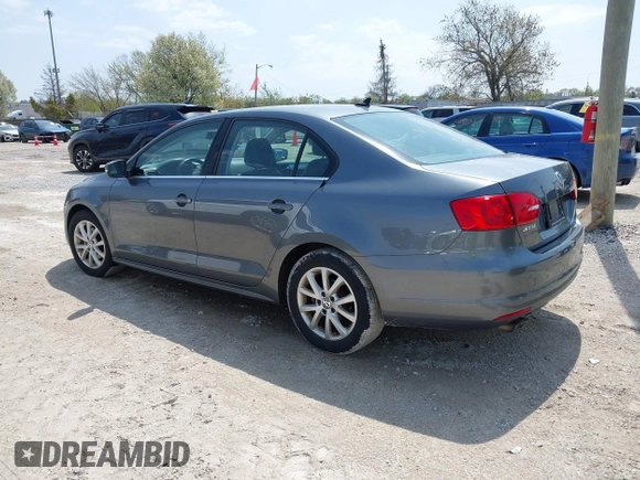 2013 Volkswagen Jetta SE z VIN 3VWDP7AJ3DM430540, wystawiony jako IAAI lot #42131097 z przebiegiem 121 838 mil mil oraz . Historia ofert i sprzedaży dostępna na DreamBid. Obrazek 3.