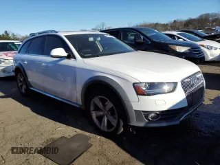 2015 Audi allroad Premium Plus with VIN WA1UFAFL5FA040210, listed as a Copart auction lot 87516935 with 128,648 mi miles and Salvage Title. Bid and sale history available at carsss.com. Image 4.