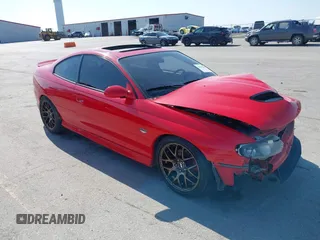 2004 Pontiac GTO z VIN 6G2VX12G24L262082, wystawiony jako IAAI lot #42215062 z przebiegiem 147 814 mil mil oraz . Historia ofert i sprzedaży dostępna na DreamBid. Obrazek 1.