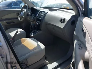 2005 Hyundai Tucson GL with VIN KM8JM12B95U097899, listed as a IAAI auction lot 41953290 with 111,090 mi miles. Bid and sale history available at carsss.com. Image 5.