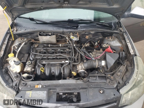 2010 Ford Focus SES with VIN 1FAHP3GN1AW244391, listed as a Copart auction lot 72893804 with Not Provided miles and Salvage Title. Bid and sale history available at DreamBid. Image 11.