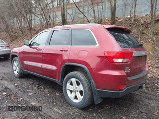 2012 Jeep Grand Cherokee Laredo with VIN 1C4RJFAG7CC123669, listed as a IAAI auction lot 42001472 with 164,806 mi miles. Bid and sale history available at carsss.com. Image 3.
