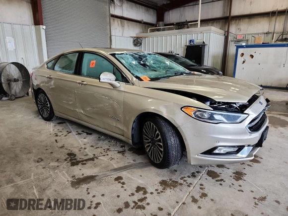 2017 Ford Fusion Hybrid Titanium with VIN 3FA6P0RUXHR154907, listed as a Copart auction lot 61295105 with 163,862 mi miles and Salvage title. Bid and sale history available at DreamBid. Image 4.