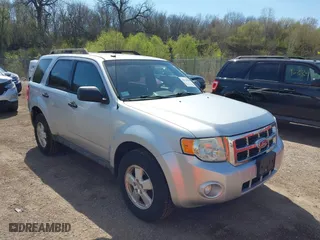 2010 Ford Escape XLT with VIN 1FMCU0D79AKB28893, listed as a IAAI auction lot 42123988 with 200,471 mi miles. Bid and sale history available at carsss.com. Image 1.