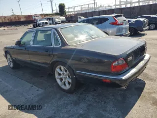 2003 Jaguar XJ with VIN SAJDA15B63MF52618, listed as a Copart auction lot 64336415 with Not provided miles and Clean title. Bid and sale history available at DreamBid. Image 2.