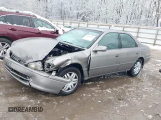 2001 Toyota Camry CE with VIN 4T1BG22K11U036462, listed as a IAAI auction lot 41606683 with 217,077 mi miles and . Bid and sale history available at DreamBid. Image 2.