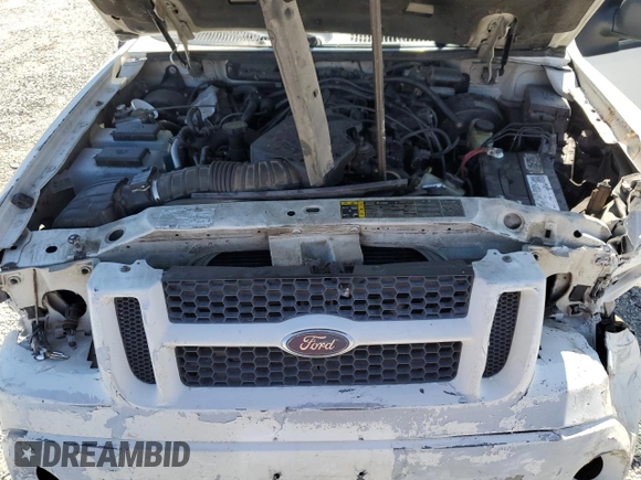 2005 Ford Explorer Sport Trac XLS z VIN 1FMZU67K05UA88775, wystawiony jako Copart lot #57905085 z przebiegiem 303 258 mil mil oraz Szkoda całkowita • Salvage title. Historia ofert i sprzedaży dostępna na DreamBid. Obrazek 11.