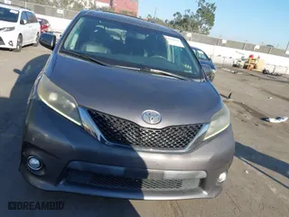 2015 Toyota Sienna SE with VIN 5TDXK3DC9FS551094, listed as a IAAI auction lot 41676903 with 94,345 mi miles. Bid and sale history available at carsss.com. Image 12.