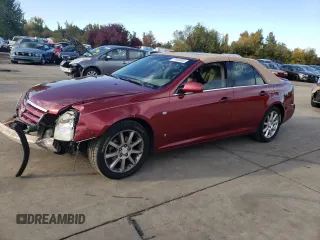 2006 Cadillac STS with VIN 1G6DC67A160153430, listed as a Copart auction lot 77452004 with 128,710 mi miles and Salvage Title. Bid and sale history available at DreamBid. Image 1.