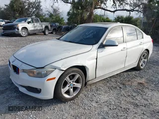 2014 BMW 3 Series 320i with VIN WBA3B1G59ENS78532, listed as a IAAI auction lot 41627172 with 133,049 mi miles. Bid and sale history available at carsss.com. Image 2.
