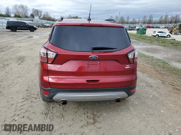 2018 Ford Escape SE z VIN 1FMCU9GD1JUC72707, wystawiony jako Copart lot #47829264 z przebiegiem 96 341 mil mil oraz Szkoda całkowita • Salvage title. Historia ofert i sprzedaży dostępna na DreamBid. Obrazek 6.