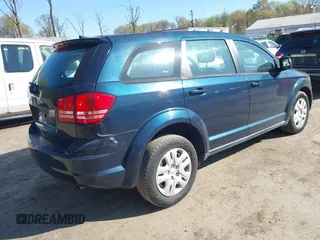 2013 Dodge Journey American Value with VIN 3C4PDCAB5DT671788, listed as a IAAI auction lot 42053985 with 128,074 mi miles and . Bid and sale history available at DreamBid. Image 4.