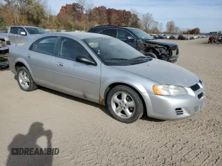 2004 Dodge Stratus SXT z VIN 1B3EL46X04N292235, wystawiony jako Copart lot #77416584 z przebiegiem 117 244 mil mil oraz Czysty tytuł • Clean title. Historia ofert i sprzedaży dostępna na DreamBid. Obrazek 4.