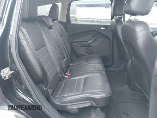 2013 Ford Escape SEL with VIN 1FMCU9H93DUC79592, listed as a IAAI auction lot 42039037 with 63,020 mi miles and . Bid and sale history available at DreamBid. Image 8.
