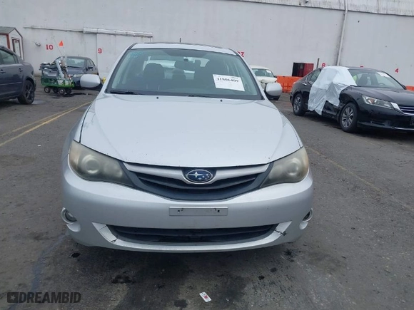 2011 Subaru Impreza Sedan 2.5i Premium with VIN JF1GE6B6XBH501203, listed as a IAAI auction lot 41806409 with 275,116 mi miles. Bid and sale history available at carsss.com. Image 12.