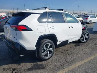 2024 Toyota RAV4 Prime SE with VIN JTMAB3FV3RD206213, listed as a IAAI auction lot 41611755 with 4,634 mi miles. Bid and sale history available at carsss.com. Image 4.