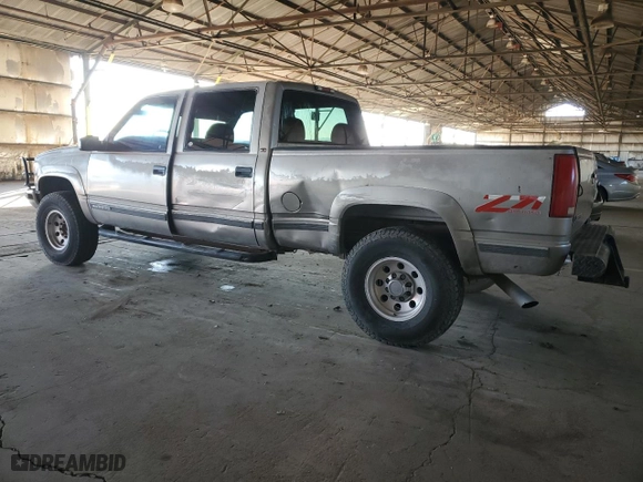 1999 GMC Sierra 2500 Crew Cab with VIN 1GTGK23R7XF048181, listed as a Copart auction lot 83923394 with NaN miles and Salvage Title. Bid and sale history available at carsss.com. Image 2.