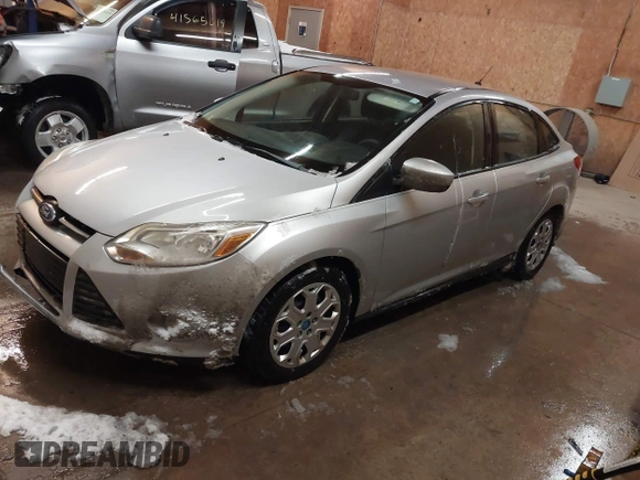 2012 Ford Focus SE with VIN 1FAHP3F2XCL175566, listed as a IAAI auction lot 41493698 with 197,255 mi miles and . Bid and sale history available at carsss.com. Image 2.