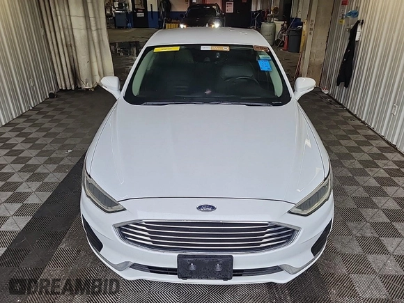 2020 Ford Fusion SEL with VIN 3FA6P0CD1LR154201, listed as a IAAI auction lot 42715761 with 99,448 mi miles and . Bid and sale history available at DreamBid. Image 48.