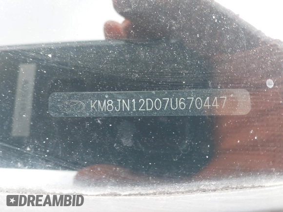 2007 Hyundai Tucson SE with VIN KM8JN12D07U670447, listed as a IAAI auction lot 41946768 with 209,079 mi miles. Bid and sale history available at carsss.com. Image 9.