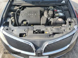 2013 Lincoln MKS с VIN 1LNHL9DK6DG602906, выставлен на аукционе Copart как лот 60415525 с пробегом 158 151 миль миль и Списание • Salvage title. История ставок и продаж доступна на DreamBid. Изображение 11.