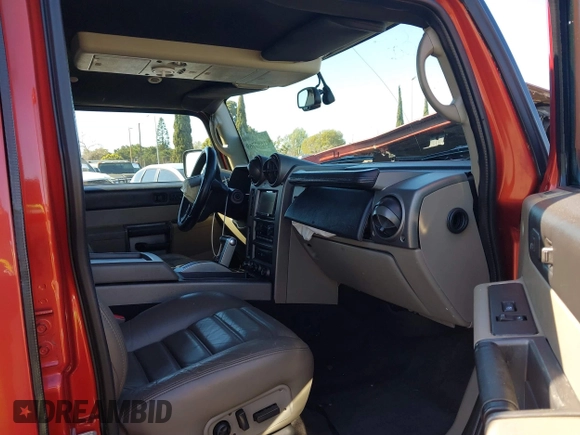 2003 Hummer H2 with VIN 5GRGN23U23H104200, listed as a IAAI auction lot 41687769 with 1 mi miles. Bid and sale history available at carsss.com. Image 5.