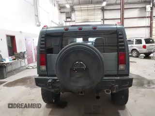 2005 Hummer H2 SUV with VIN 5GRGN23U65H132505, listed as a IAAI auction lot 41515346 with 140,944 mi miles. Bid and sale history available at carsss.com. Image 16.