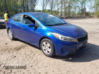 2017 Kia Forte LX with VIN 3KPFK4A70HE052223, listed as a IAAI auction lot 42036382 with 136,671 mi miles. Bid and sale history available at carsss.com. Image 1.