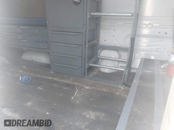 2012 Ford Econoline Cargo Commercial with VIN 1FTNE2EL2CDB10454, listed as a IAAI auction lot 41992574 with 210,118 mi miles and . Bid and sale history available at DreamBid. Image 8.