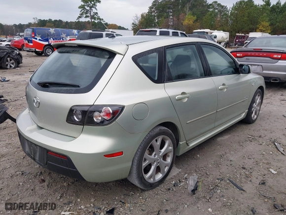 2009 Mazda Mazda3 s Touring with VIN JM1BK343591212313, listed as a IAAI auction lot 41014196 with 40,330 mi miles. Bid and sale history available at carsss.com. Image 4.