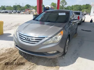 2014 Hyundai Sonata SE with VIN 5NPEC4AC4EH908832, listed as a IAAI auction lot 42099613 with 136,486 mi miles and . Bid and sale history available at DreamBid. Image 2.