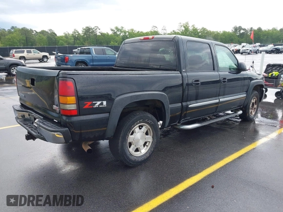 2006 GMC Sierra 1500 SLT with VIN 2GTEK13T561232618, listed as a IAAI auction lot 42086899 with 310,473 mi miles and . Bid and sale history available at carsss.com. Image 4.
