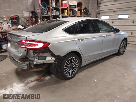 2018 Ford Fusion Titanium with VIN 3FA6P0D91JR138698, listed as a IAAI auction lot 41992522 with 95,017 mi miles and . Bid and sale history available at DreamBid. Image 4.